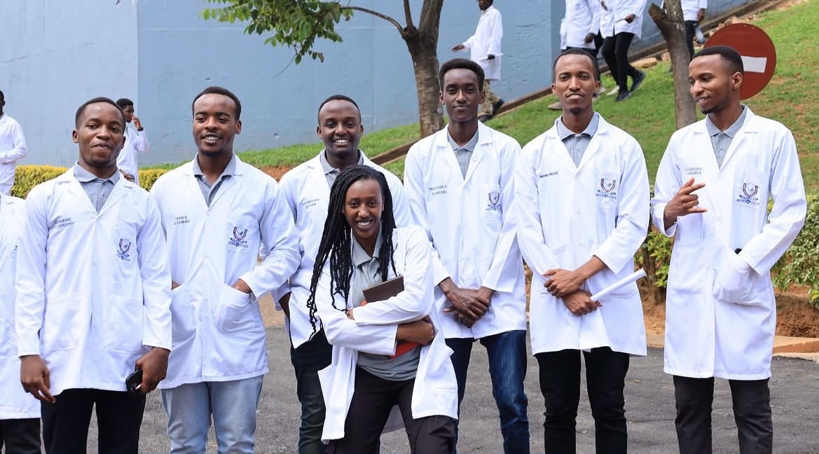 Inshuti Connect student responders in white lab coats
